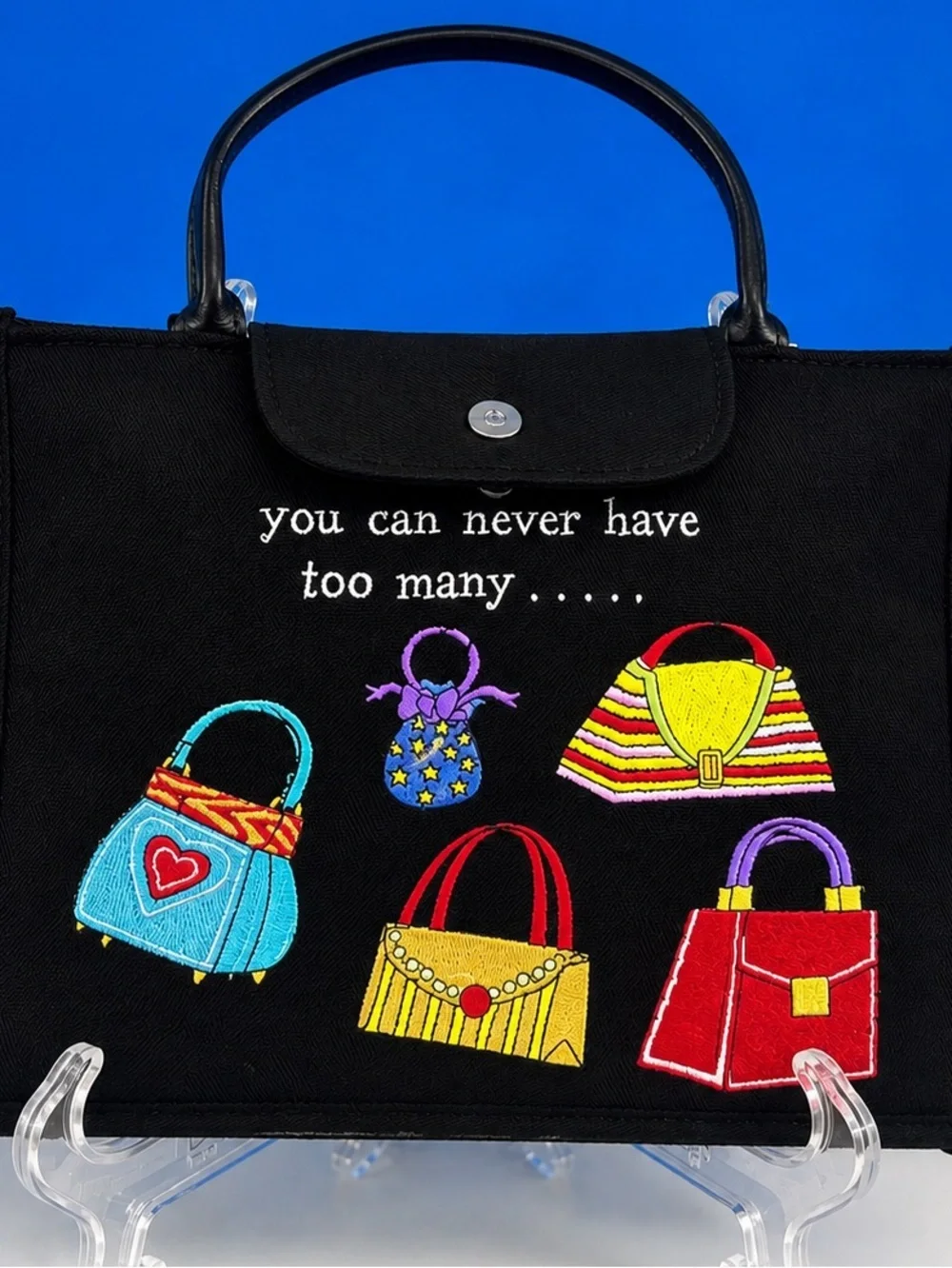 Fun and playful Girlfriend brand purse featuring colorful embroidered handbag